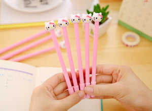 Hand Holding Five Hello Kitty Themed Colored Gel Pen