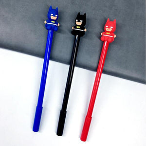 Three Batman Themed Colored Ball Pen Displayed on a black board